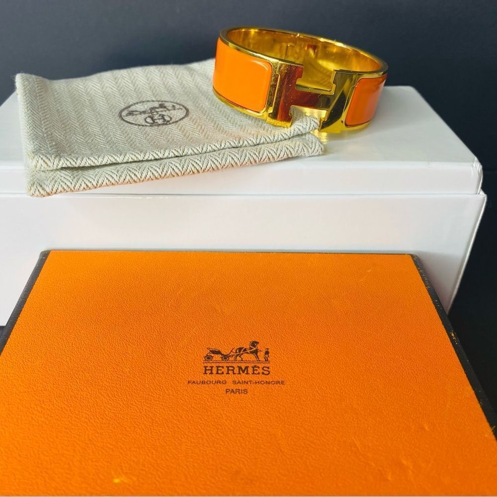 HERMES Signature Orange Enamel and Gold Plated Clic-Clac H GM Wide Bracelet
